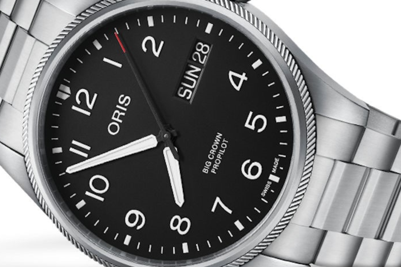 A close-up of a stainless steel Oris watch with a black dial, available at Solomon Brothers Jewelers. A close-up of a stainless steel Oris watch with a black dial, available at Solomon Brothers Jewelers.