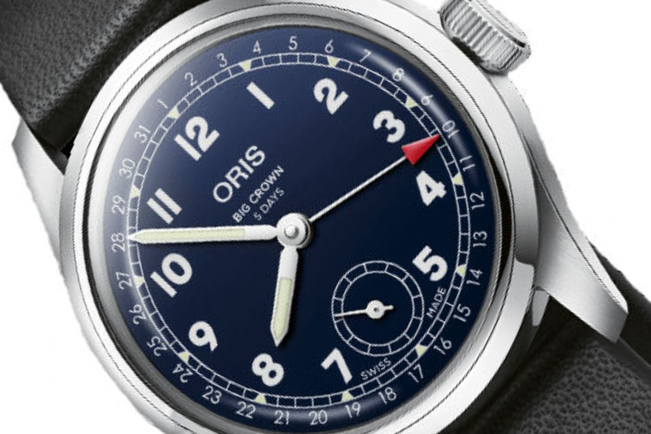 A close-up of an Oris watch with black leather straps and a navy blue dial, available at Solomon Brothers Jewelers. A close-up of an Oris watch with black leather straps and a navy blue dial, available at Solomon Brothers Jewelers.